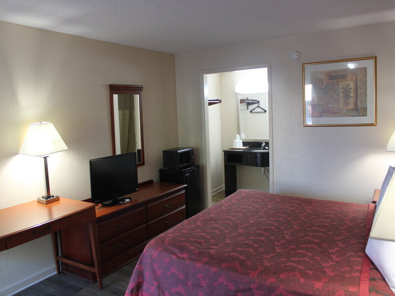 View of a room with a King Bed at the Travel Inn of Buford, Buford GA